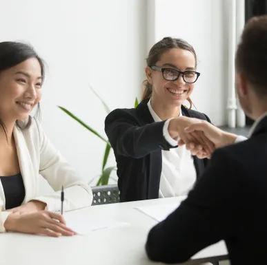 business meeting with people shaking hands